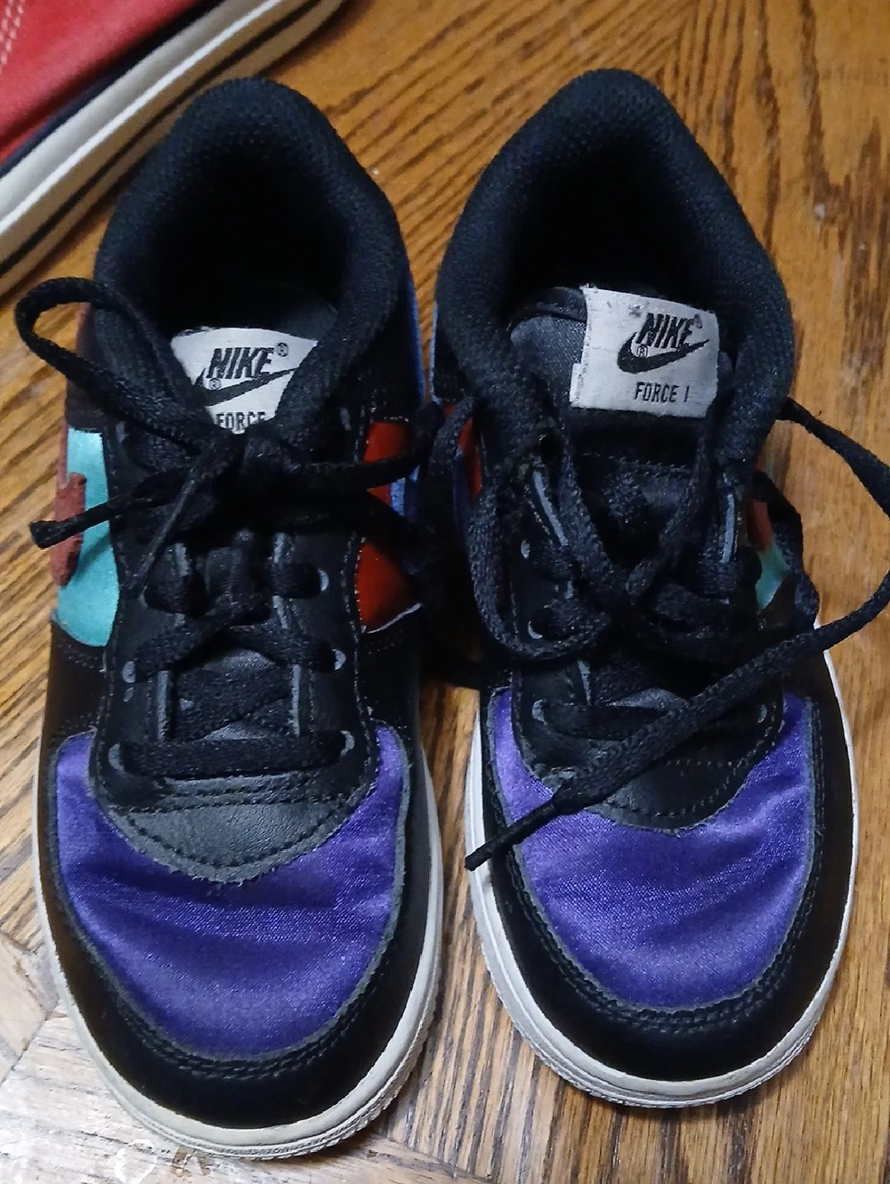 Nike Kids Sneakers in Black with Purple, Teal & Orange Accents